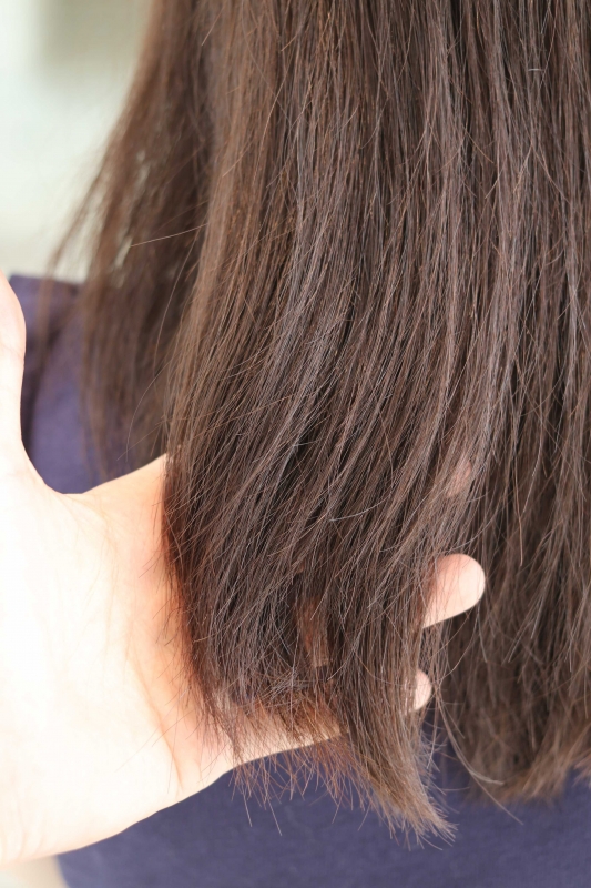 広がりのせいで髪を汚く見せてしまっている髪の改善 くせ毛 縮毛矯正 ヘアケアの専門特化集団 表参道 青山の美容室lily リリィ